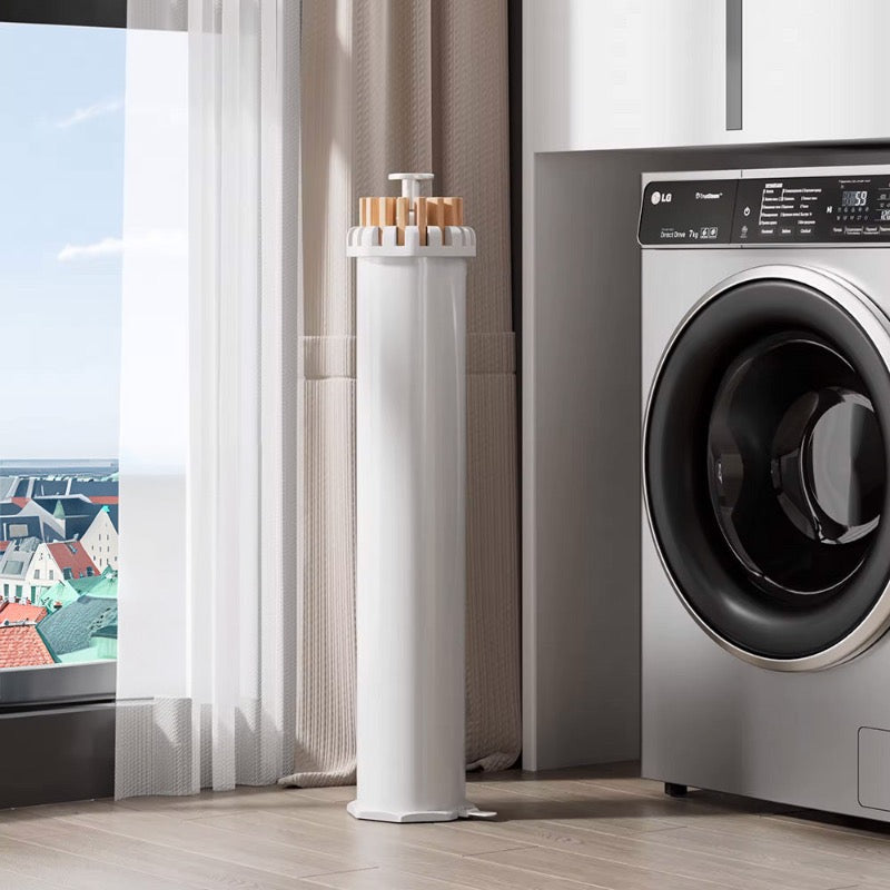 SmartRack tørrestativ i vaskerum ved vaskemaskine – pladsbesparende løsning